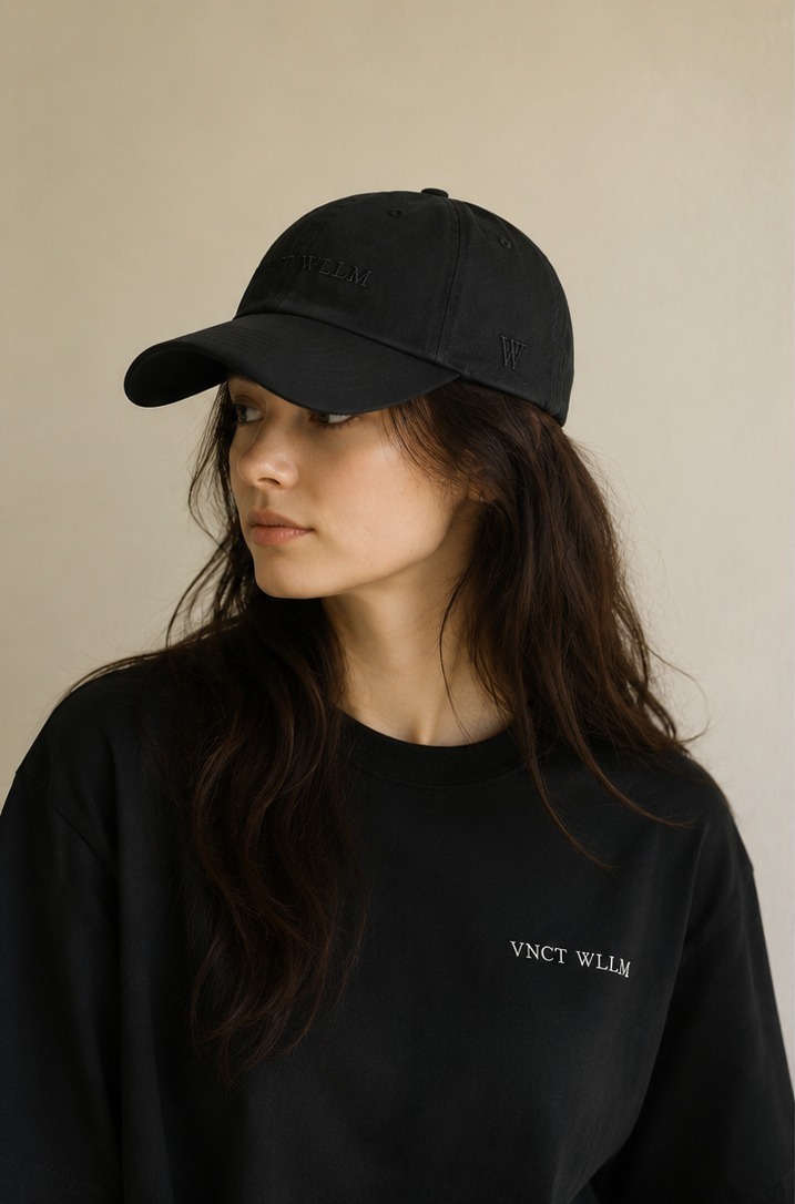 Élude — Cap in washed black, worn front and side view